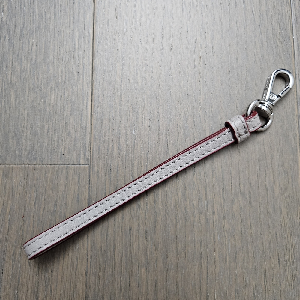 Brand New MZ Wallace Gray and Red Wristlet Strap